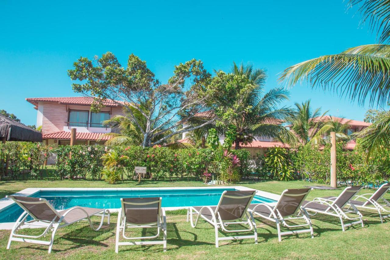 פורטו סגורו La Torre Resort All Inclusive מראה חיצוני תמונה A pool at a resort in Punta Cana