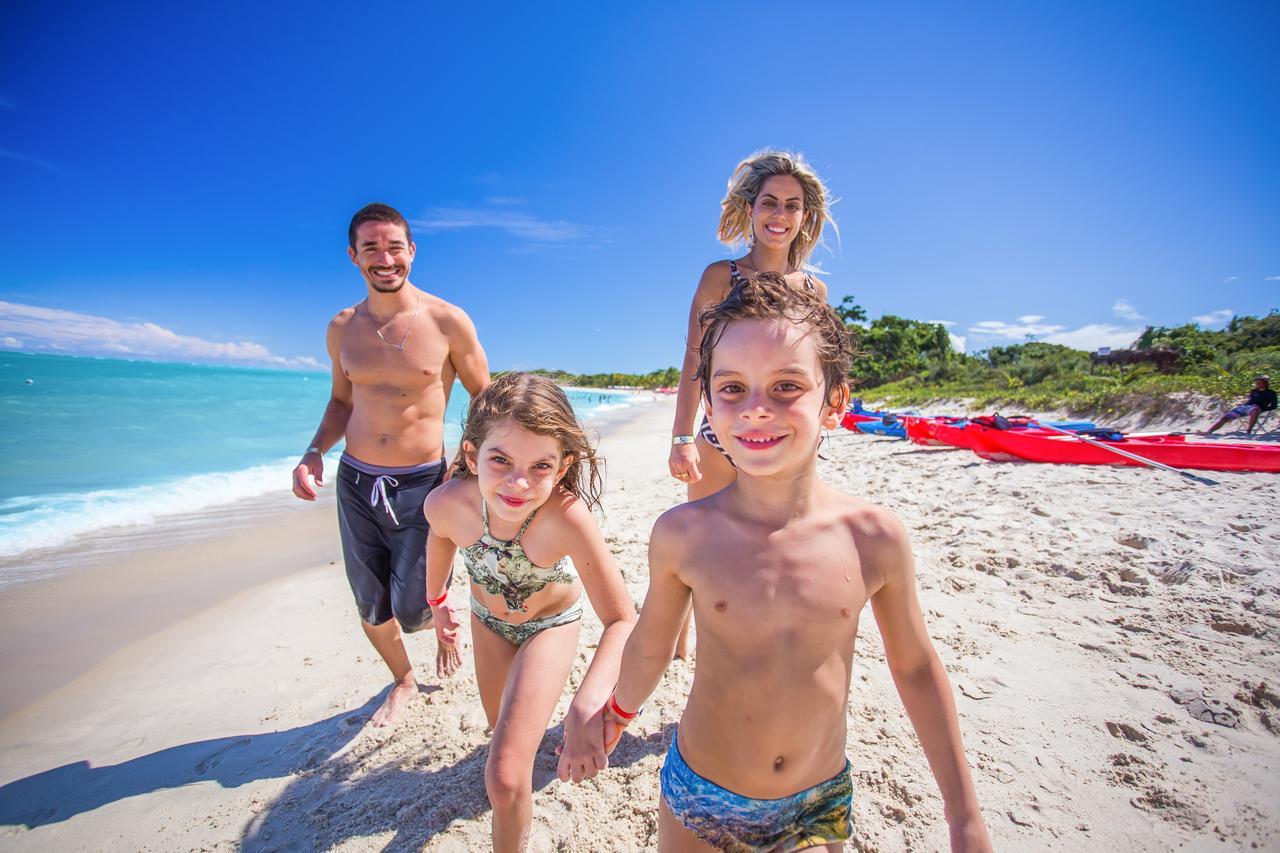 פורטו סגורו La Torre Resort All Inclusive מראה חיצוני תמונה Family on a beach